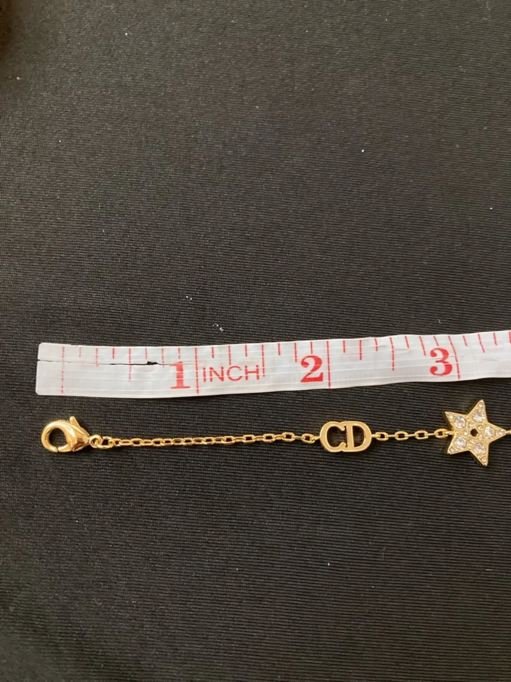 Dior Gold Tone Bracelet with Crystal Star & Clover Charms